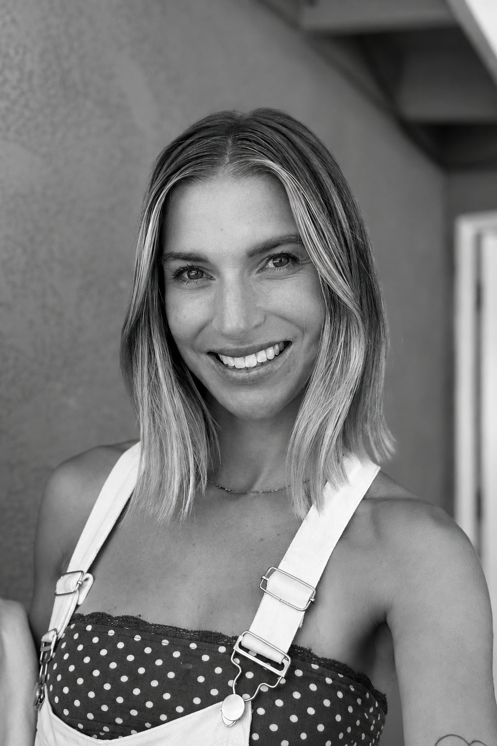Black and white headshot of Madisen W., graphic designer