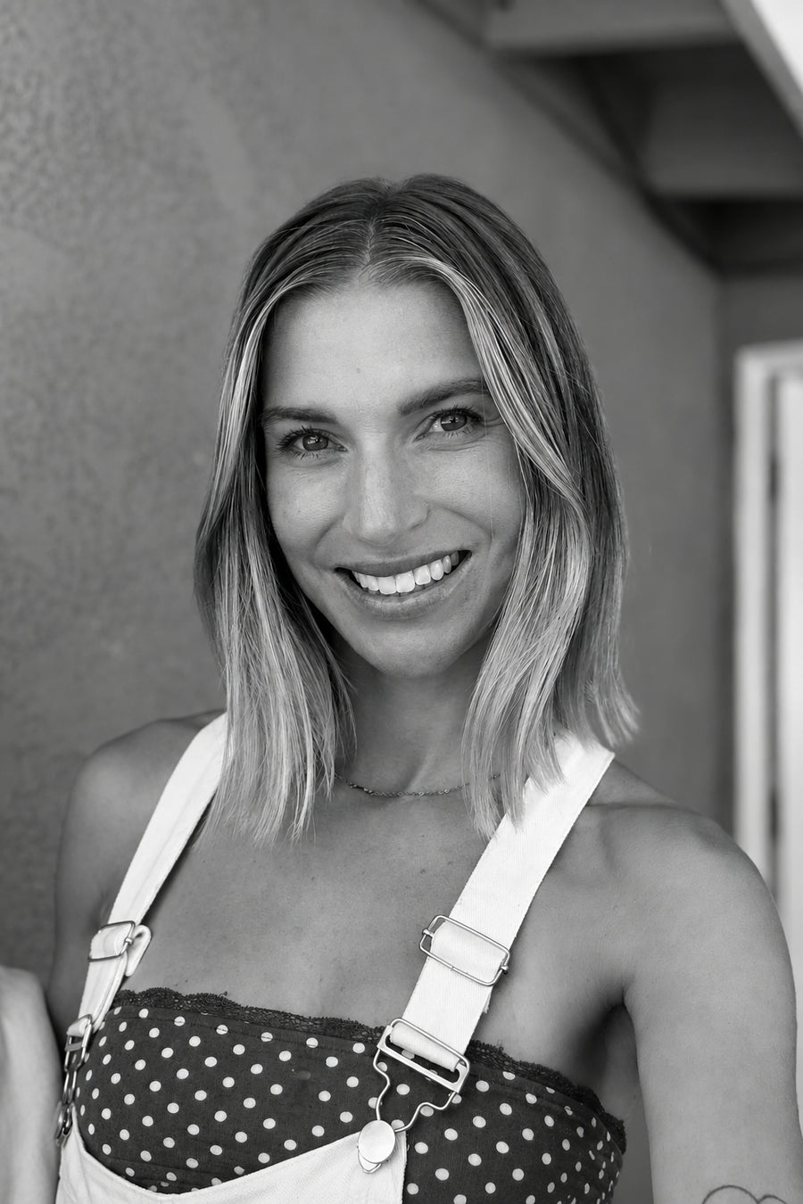 Black and white headshot of Madisen W., graphic designer