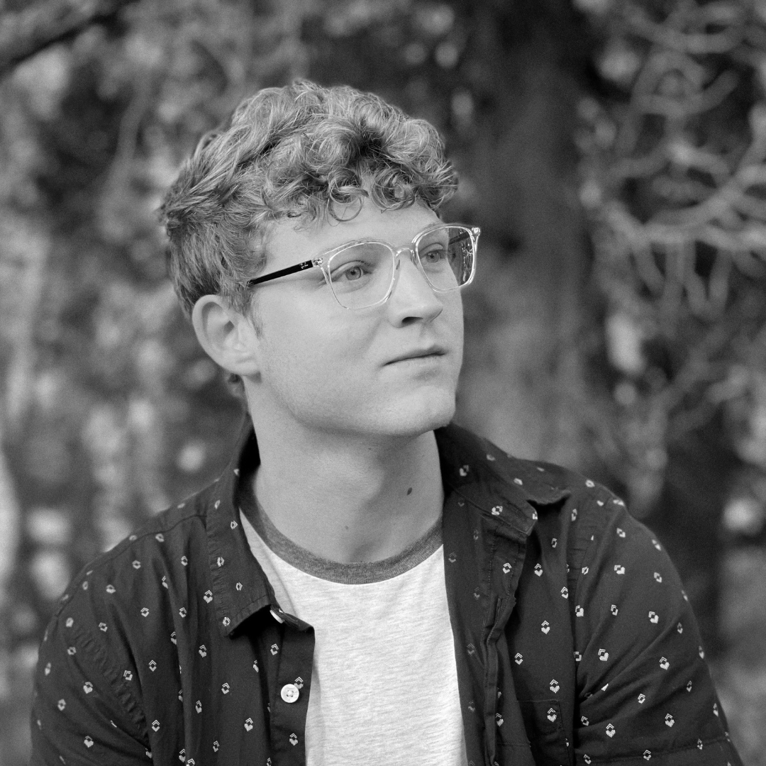 Black and white headshot of Noah R., director and editor