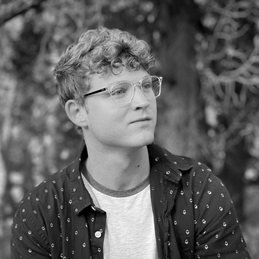 Black and white headshot of Noah R., director and editor