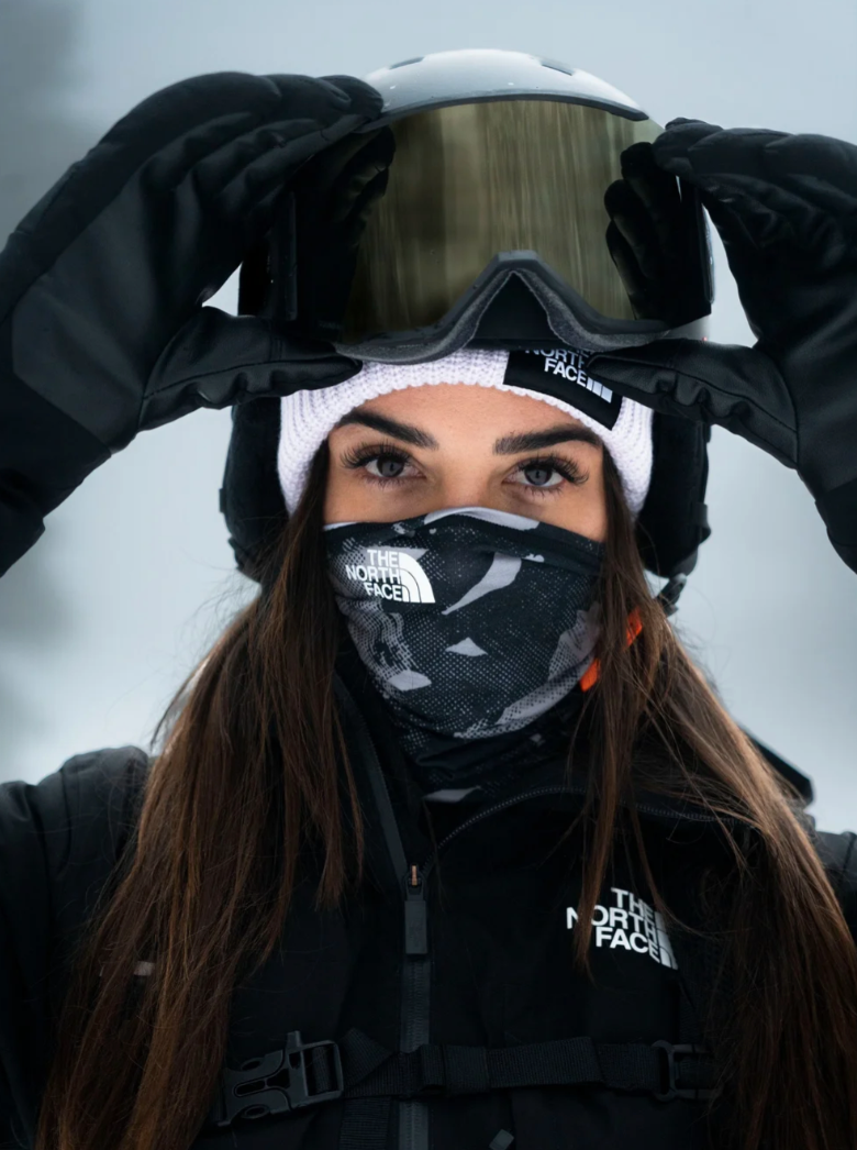 Skier in goggles and a face mask, brand campaign still by Leo R.